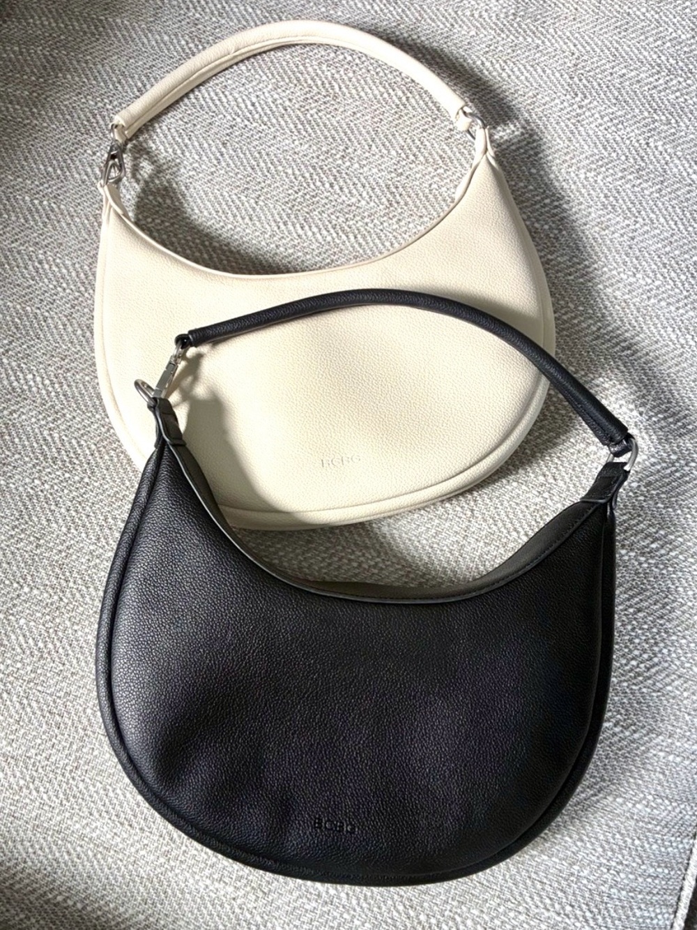 Bundle of TWO BCBG Cream and Black Crescent Leather Minimalist Shoulder Bags